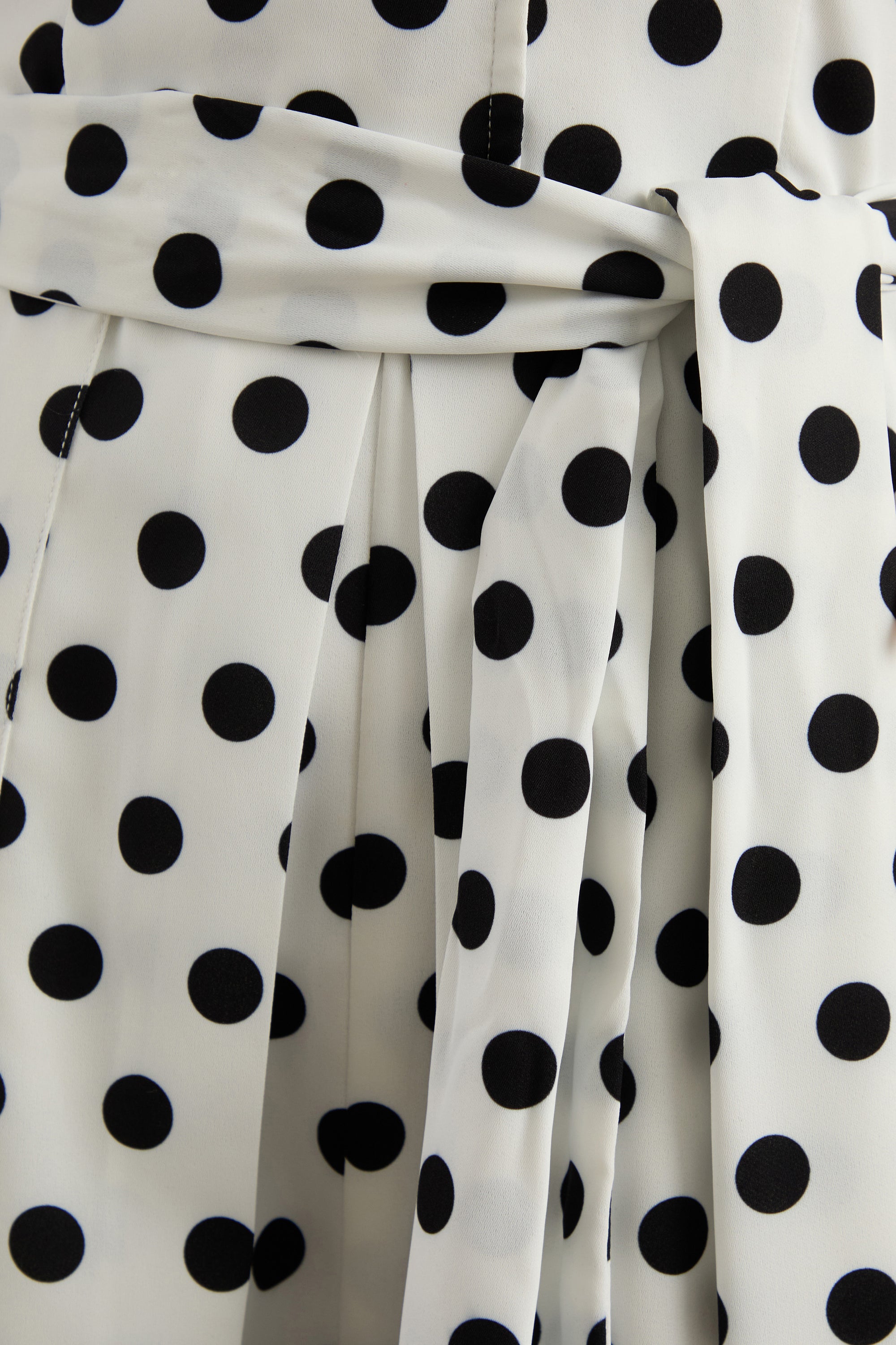 ECM_HR_CL138201110 - Kerina | White Polka Dot Plunge-Neck Playsuit With Belt Detail 4.jpg